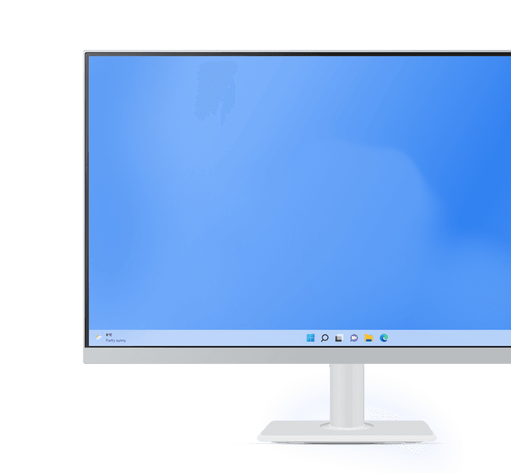 Close-up of a monitor displaying a Windows desktop with a bright blue background.